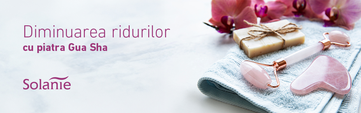 Diminuarea ridurilor cu piatra Gua Sha